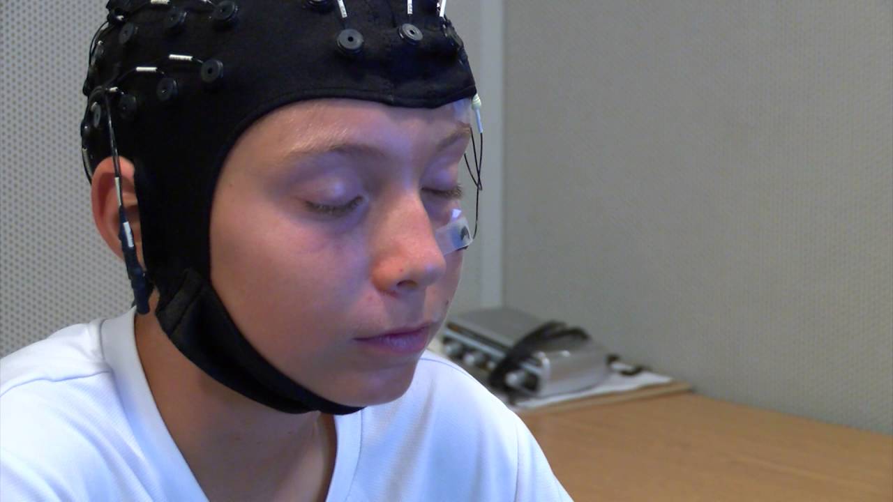 Lab participant wearing a brain scanning device